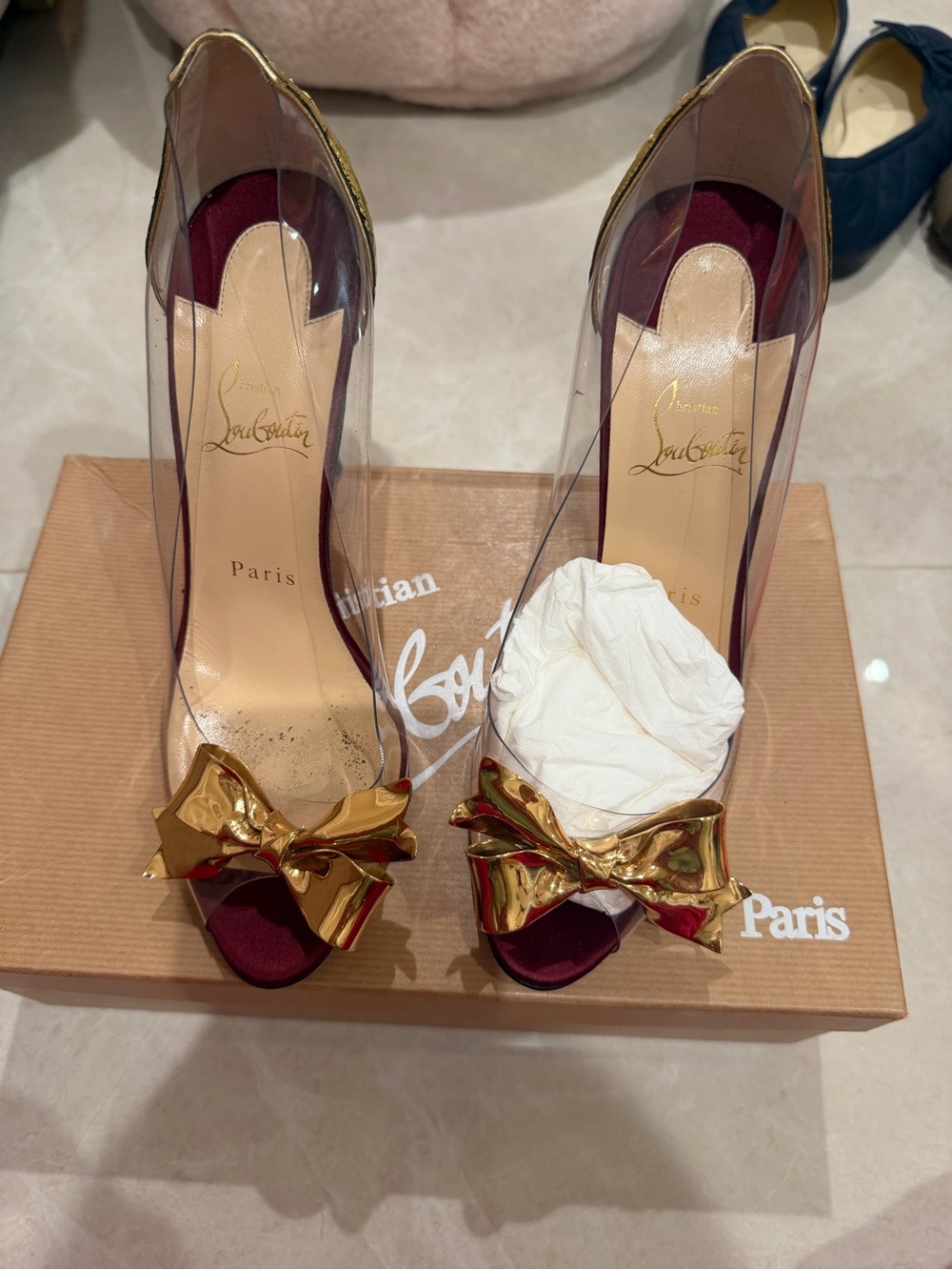 Christian Louboutin Clear PVC Peep-Toe Pumps with Gold Bow and Burgundy Insole